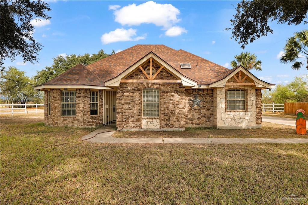 Single Family home at 1401 Mile 3 Road, Palmhurst, Texas