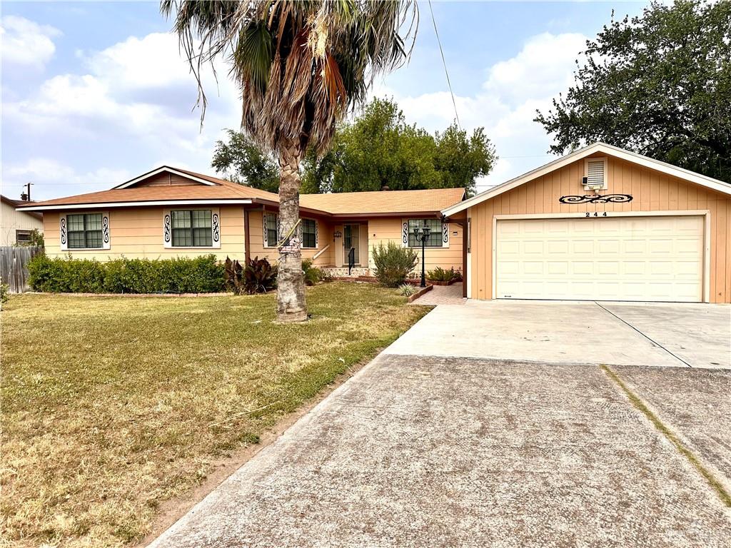 Single Family home at 244 10th Street, Raymondville, Texas