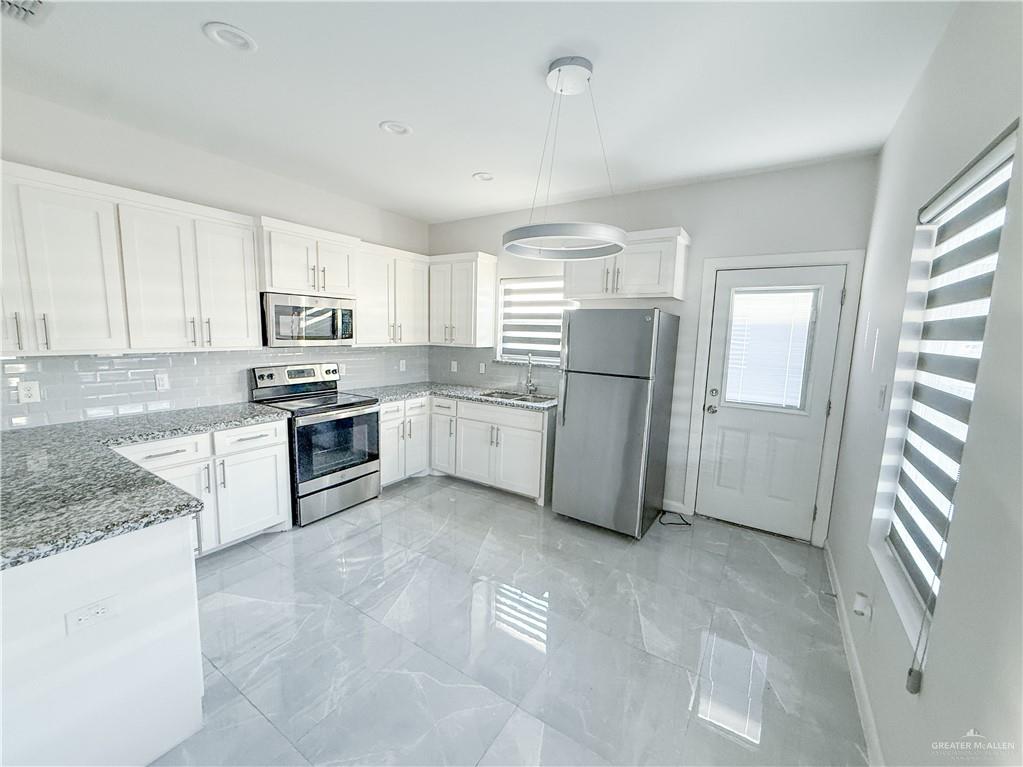 Photo 4 of 5704 Puffin Avenue #4